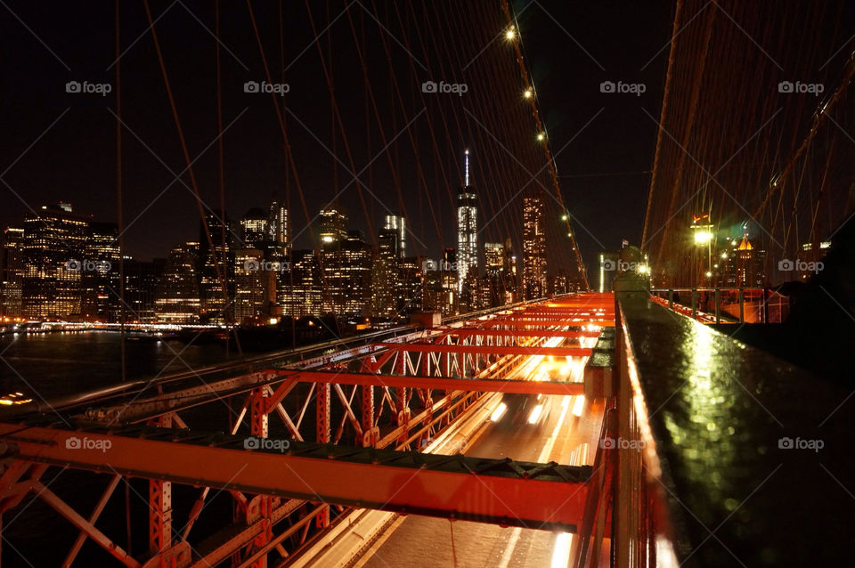 Manhattan night. Manhattan view on Brooklyn bridge