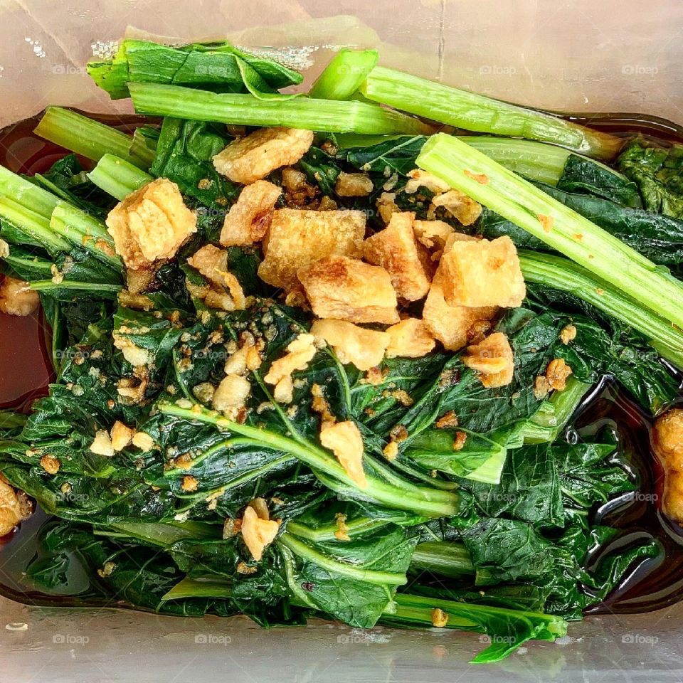 Dang gui duck, roasted pork belly, char siew, century egg dumpling and vegetables 