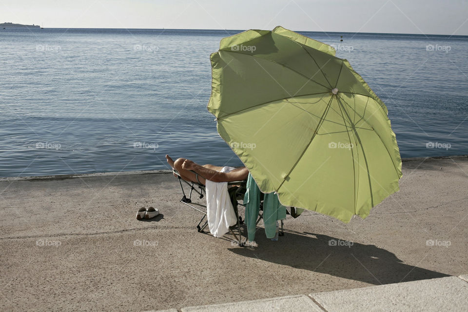 lazy turista with umbrella