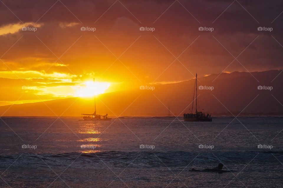 Fiery sunset at Waikiki Beach, HI