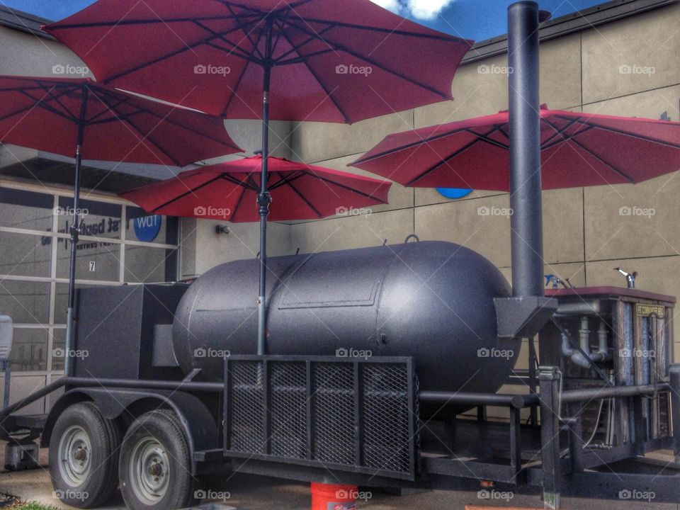 BBQ is bigger in Texas . BBQ grill/trailer