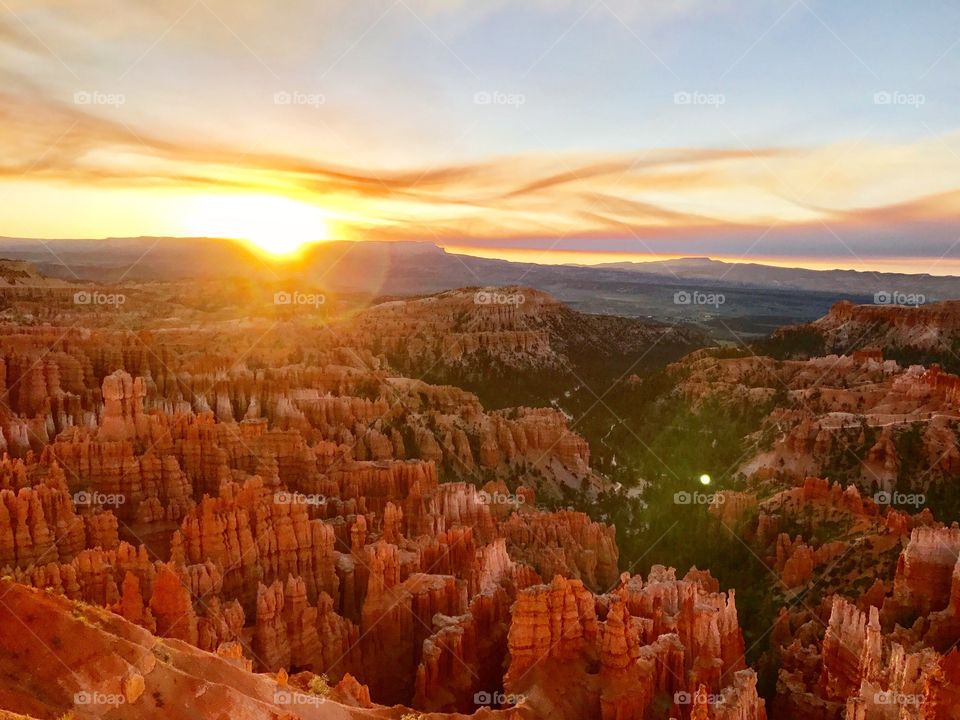 Arizona Forest smoke in the distance of the Bryce Canyon sunrise 