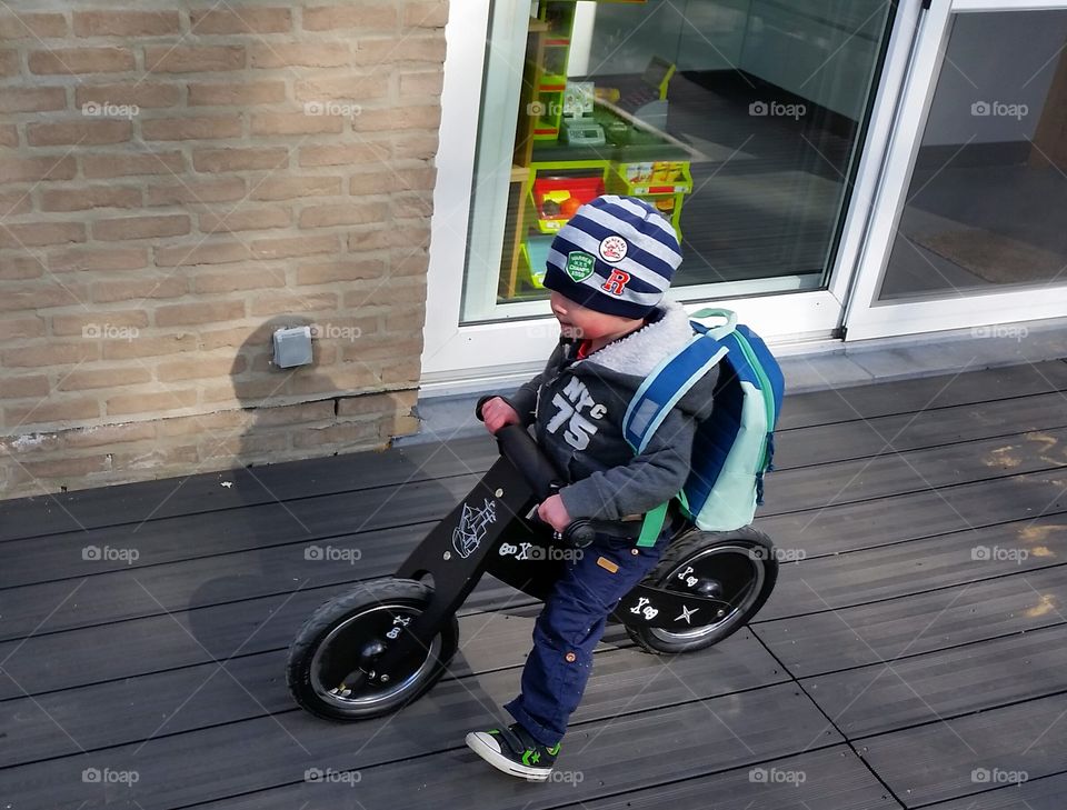 kid on bike