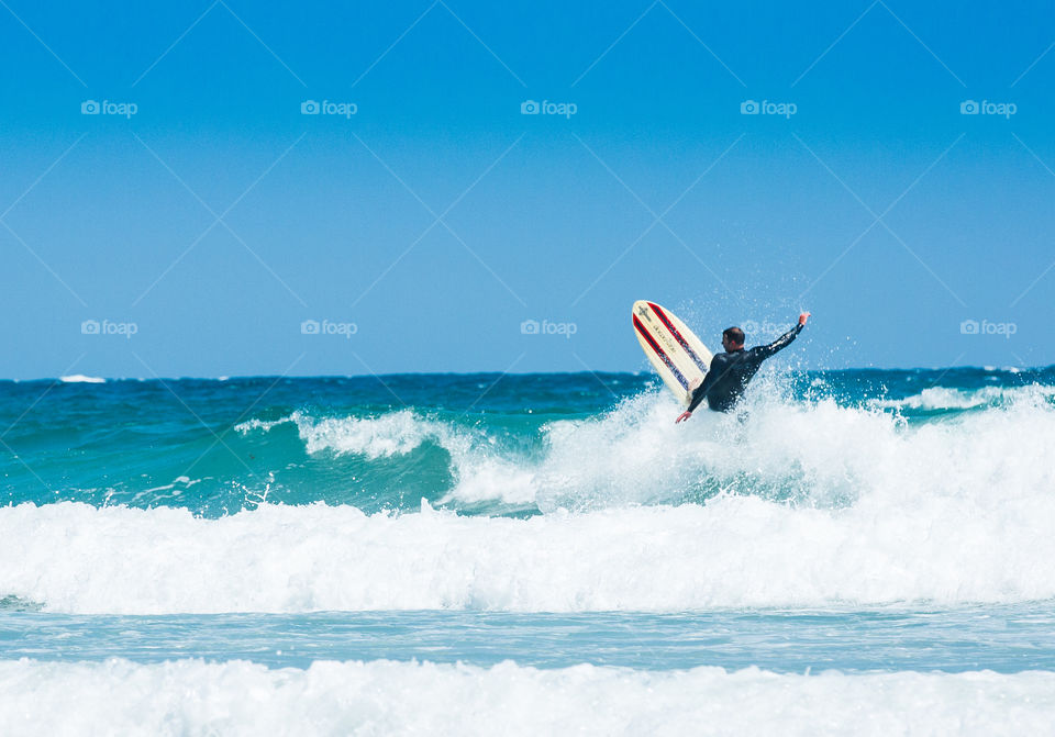 A surfer wipeout