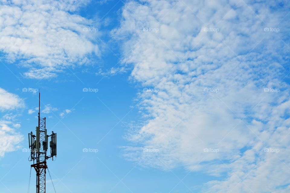 Phone transmitter antenna and sky.