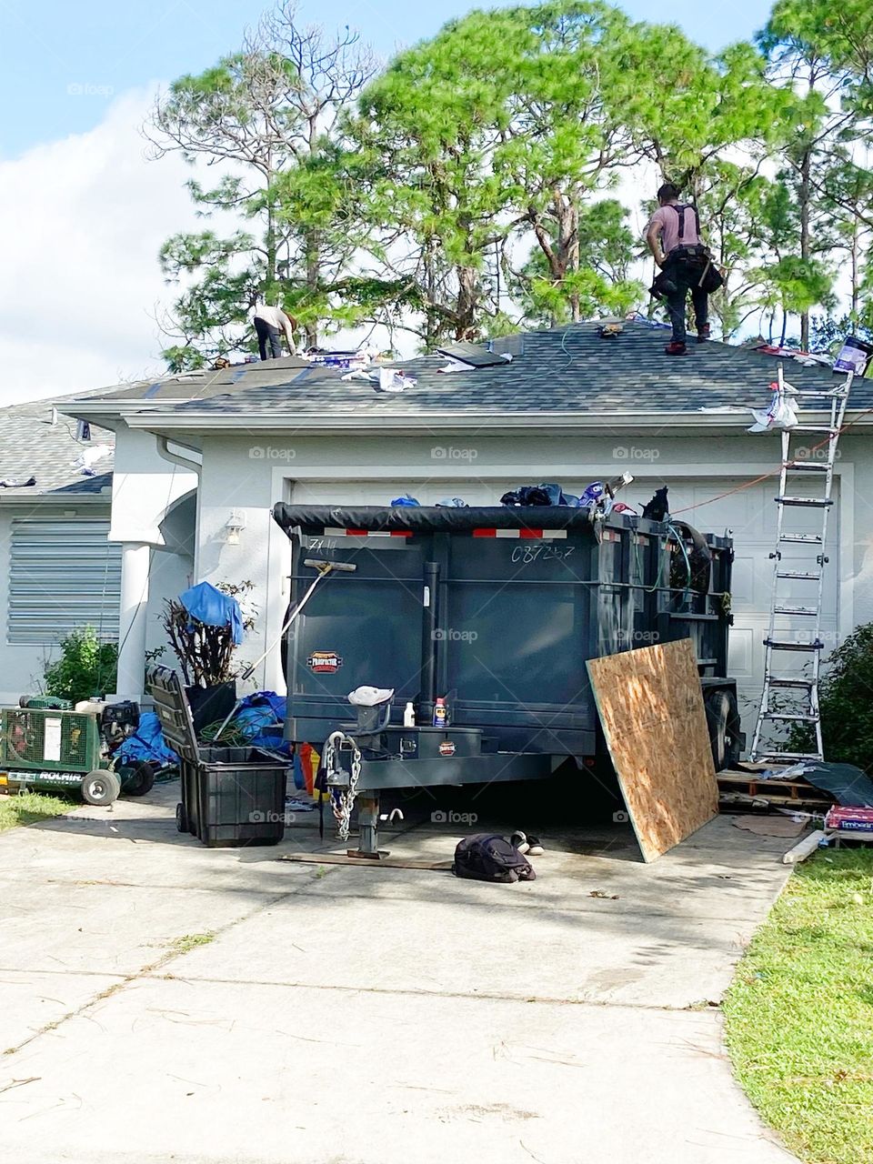 New roof installation after hurricane.