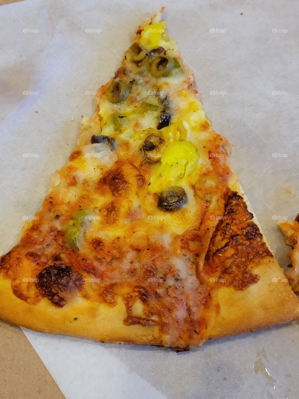 Delicious slice of pizza