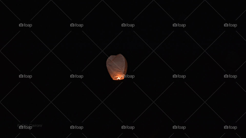 Paper lantern in the dark sky.
