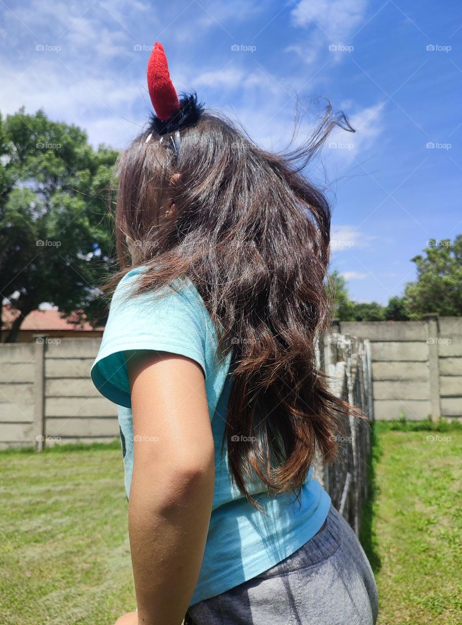 Hair blowing in the wind