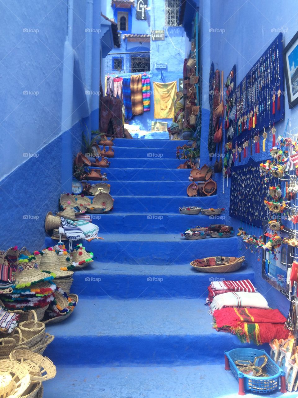 A colorful market in the equally colorful streets of Chefchaouene, Morocco.