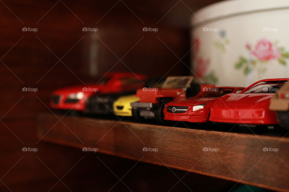 different car models on the shelf