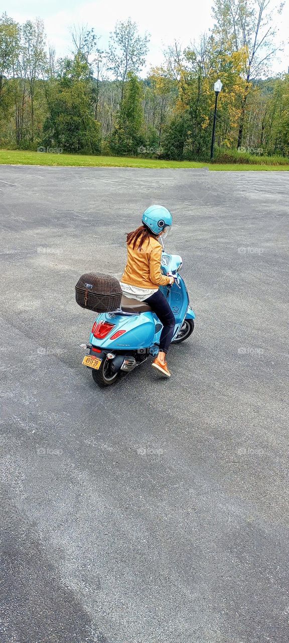 Blue Scooter Rider