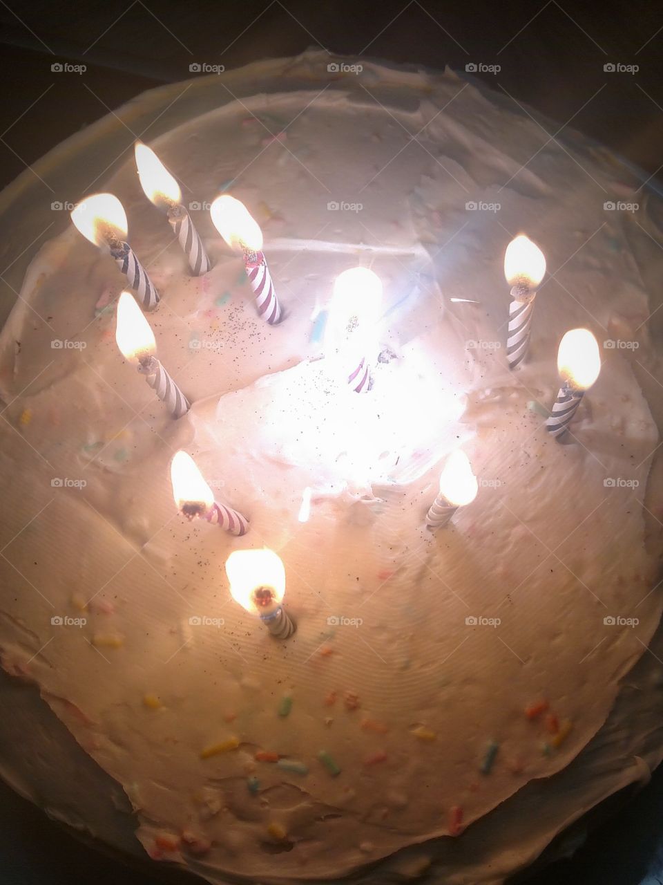 Sparkler candle on birthday cake