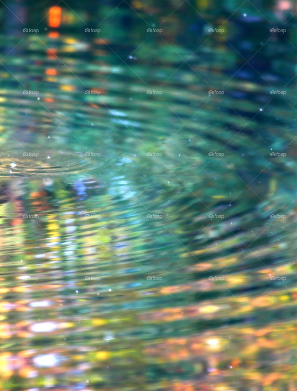 Colored Ripples. The wonders of water can be as simple as a ripple.