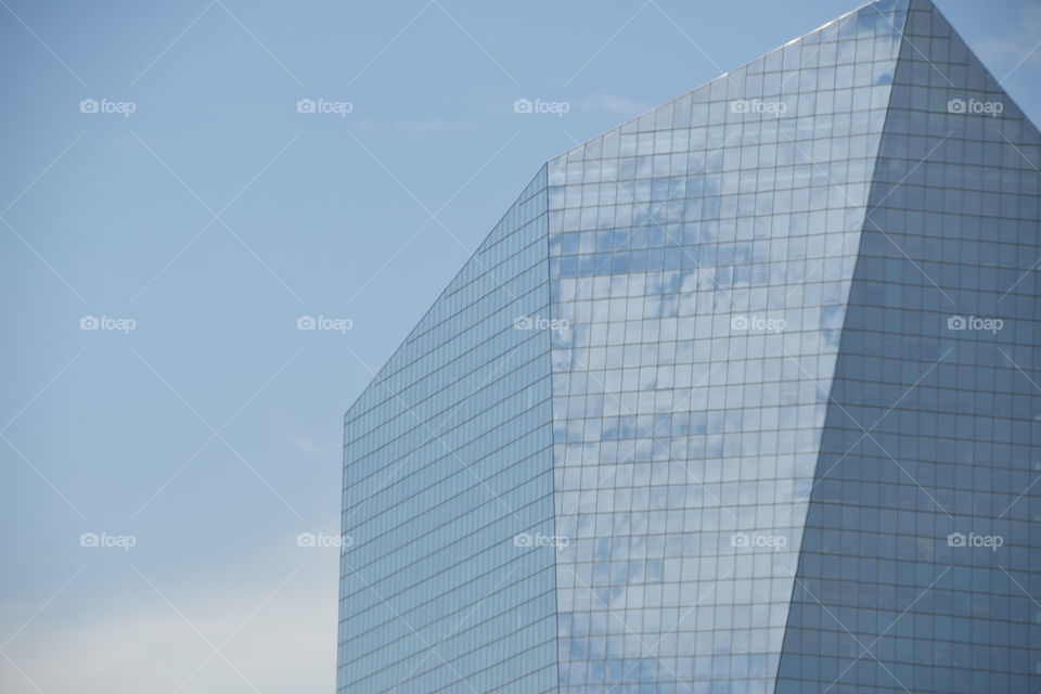 Skyscraper close-up with clouds