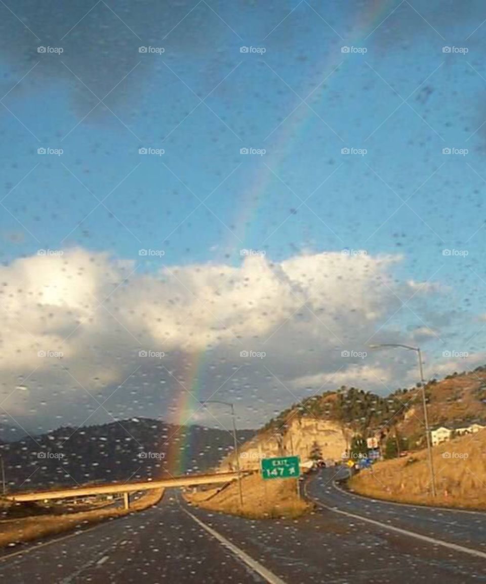rainbow while on a road trip 