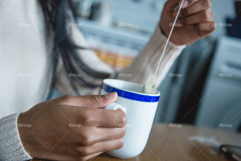 A woman drinking herbal tea