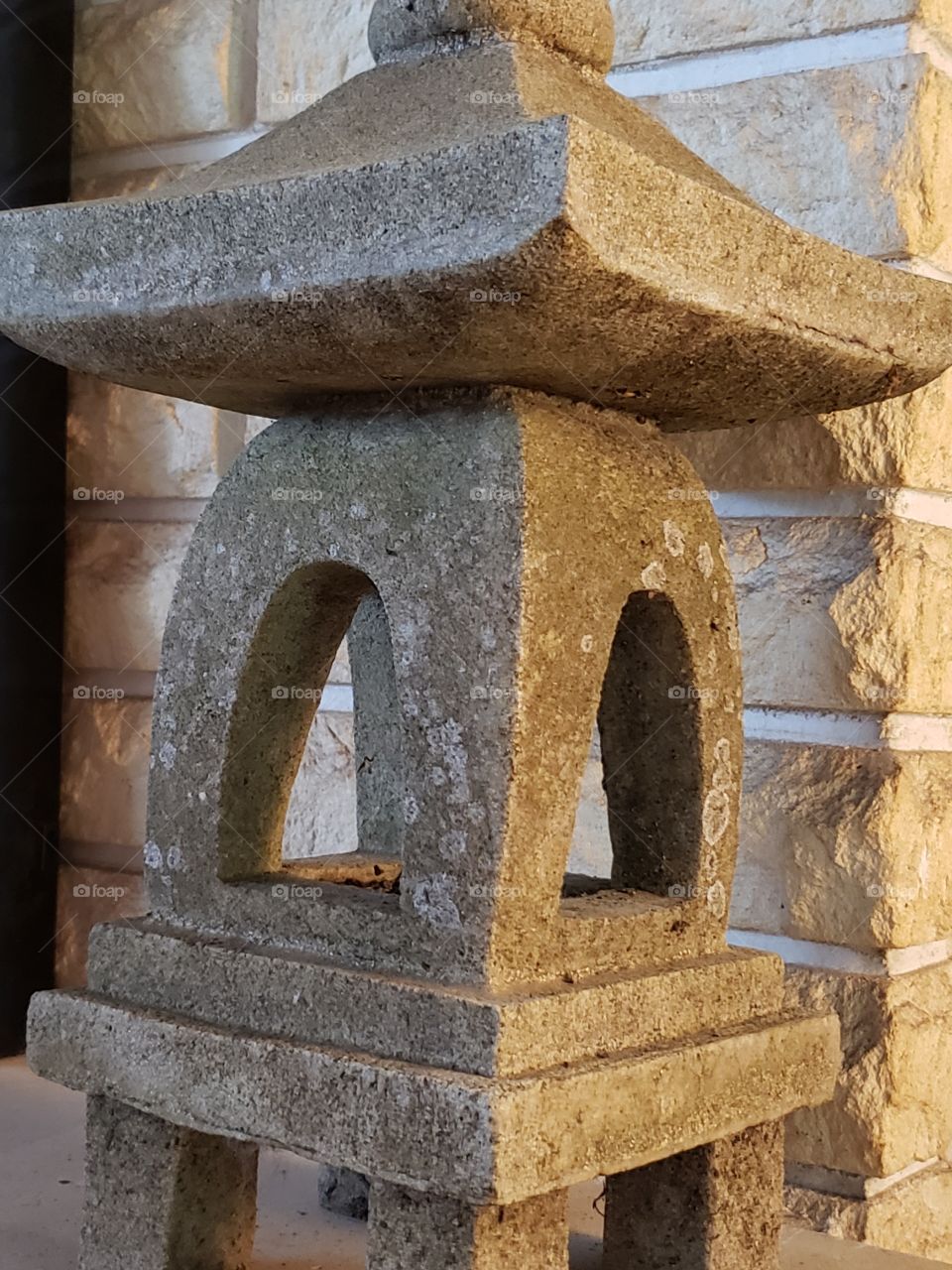 stone Japanese structure by bricks