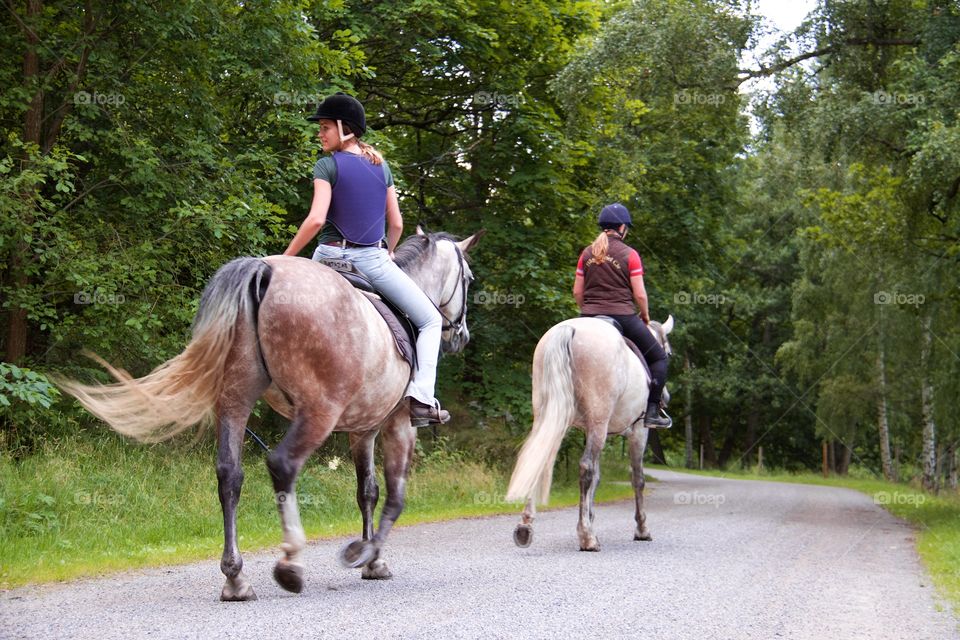 Women riding on horse