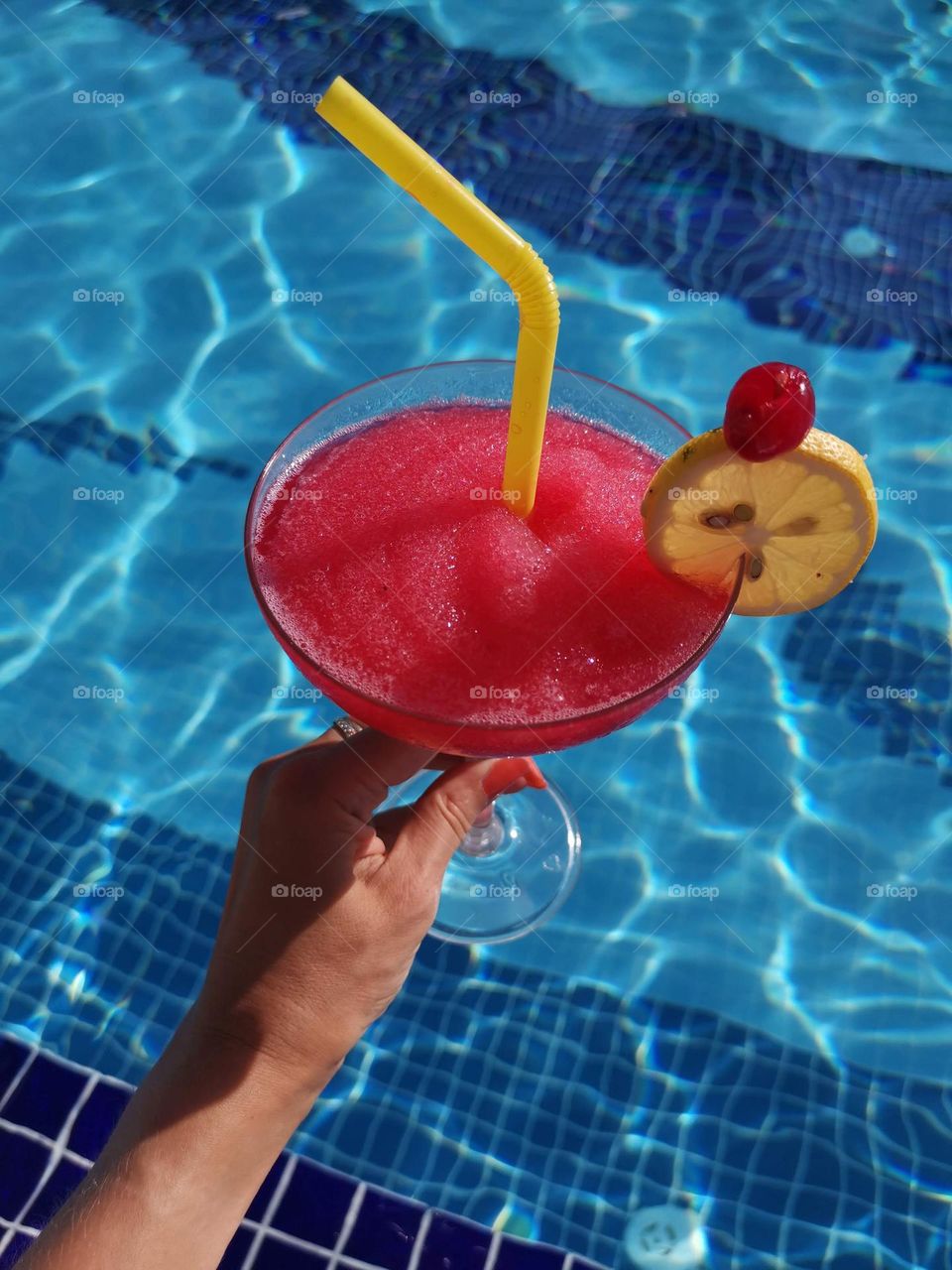 Liquids are cool. Tasty cocktails. Summer time, summer mood. Relax in a swimming pool.