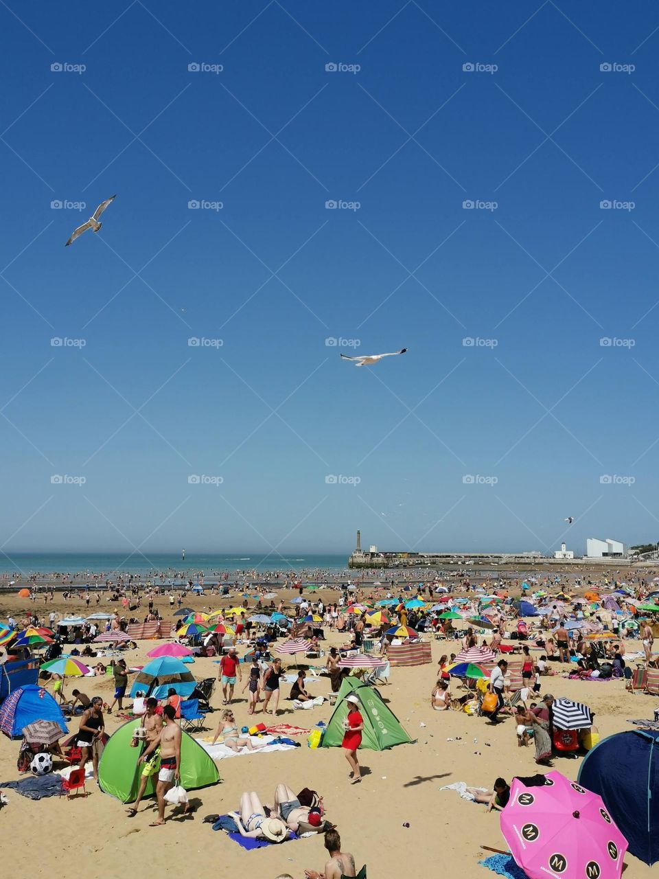 Summer time. Crowd on the beach.