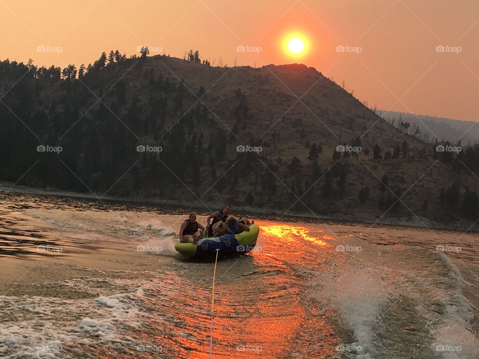 Tubing on Canyon Ferry Lake in the middle of wildfire season, located in Montana.