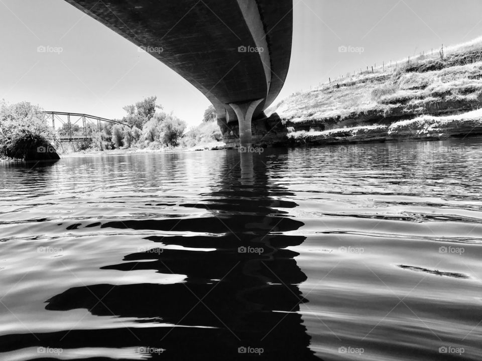 Under the bridge in black and white 