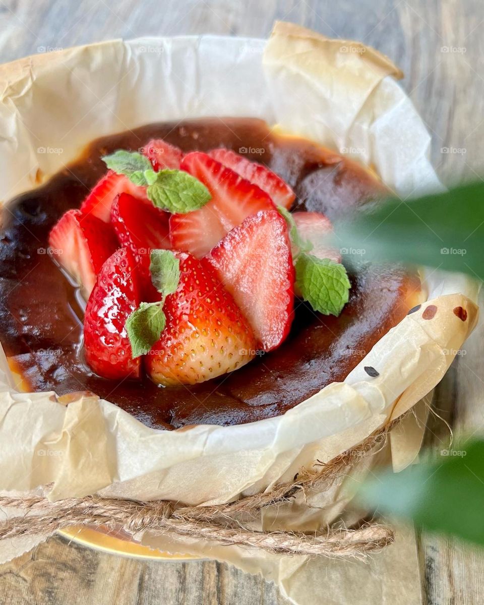 Apricot glazed strawberries basque burnt cheesecake 