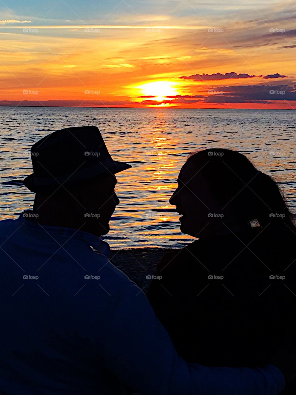 Silhouette of couple at beach
