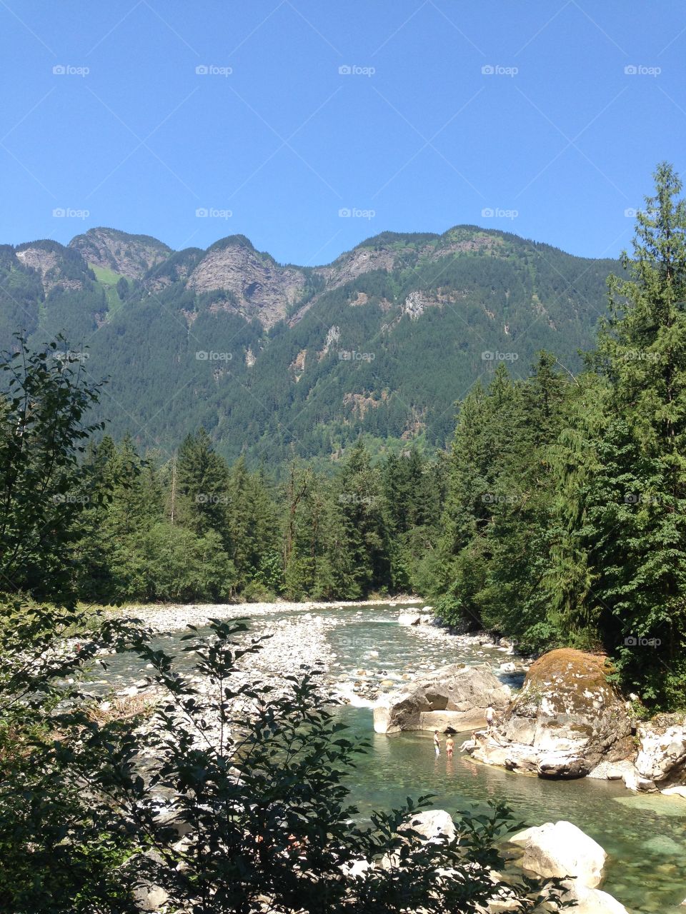 Some kids jumping in the river on the way to the Othello Tunnels.