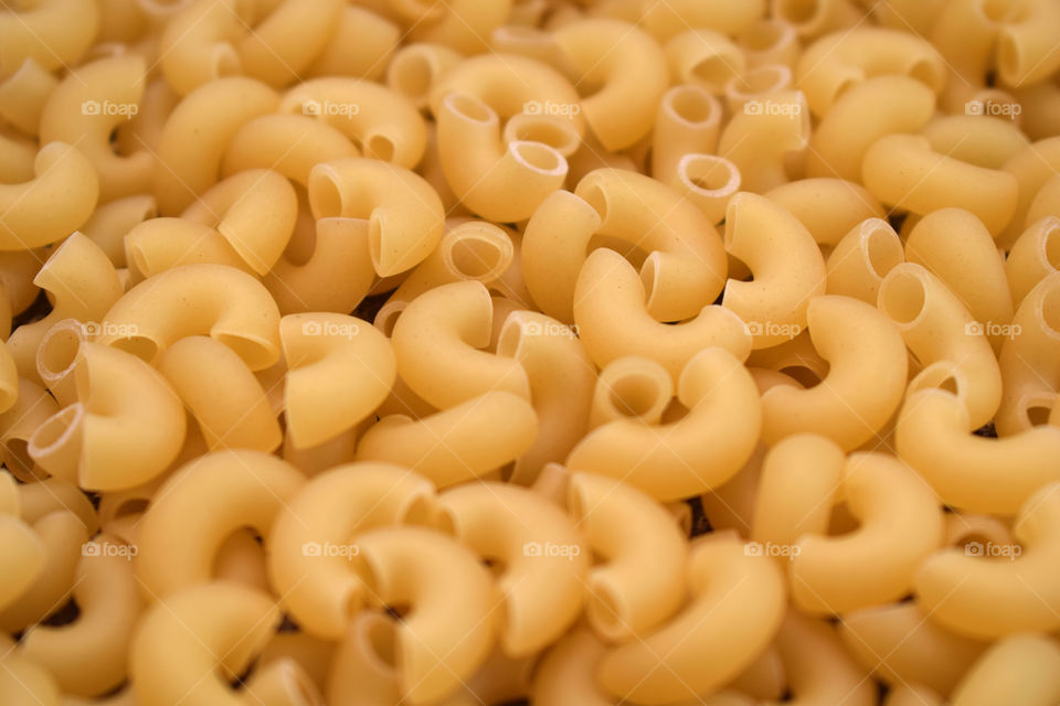 A scattering of yellow macaroni horns