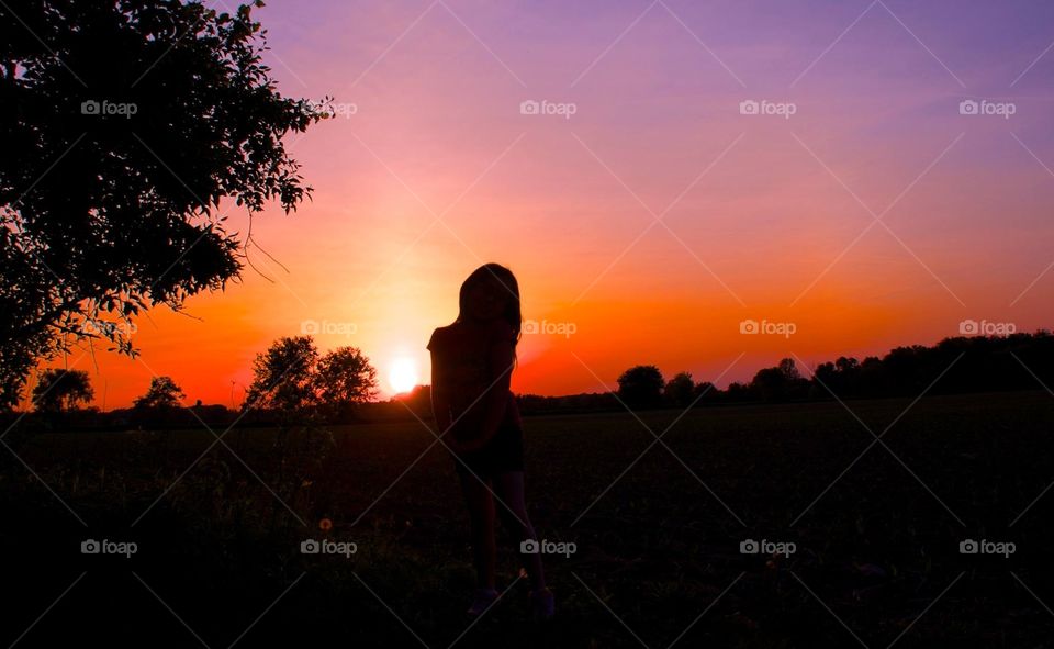 Girl in the Spring sunset. girl in the sunset