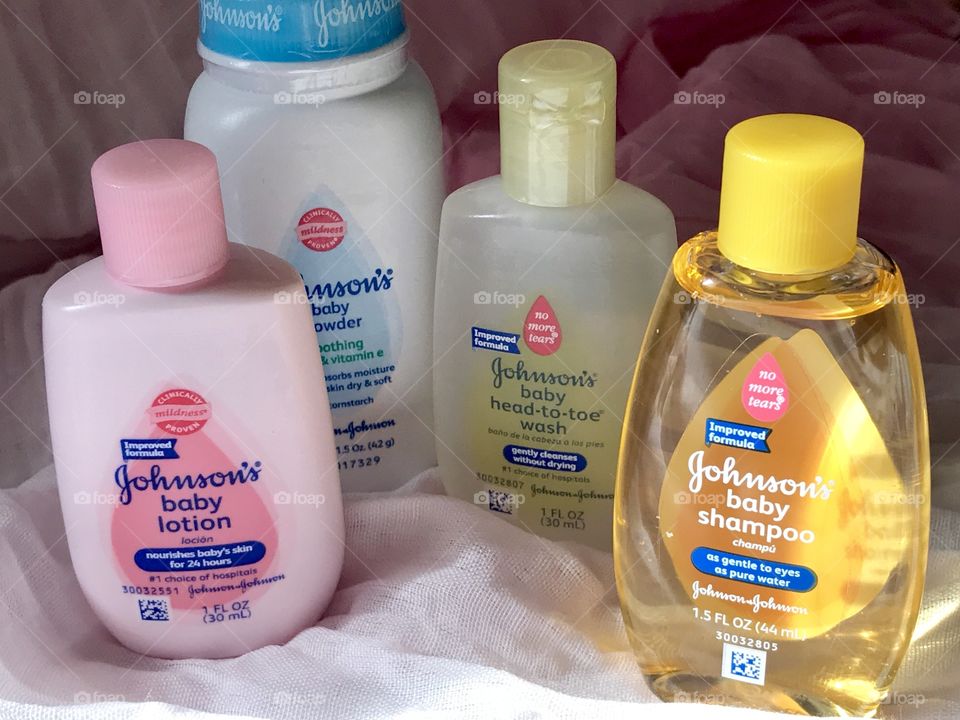 Johnson and Johnson baby products with a soft pink background