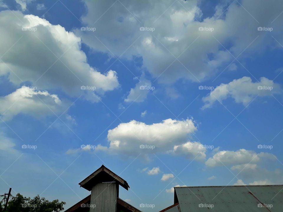 chimney and rooftop in the open sky