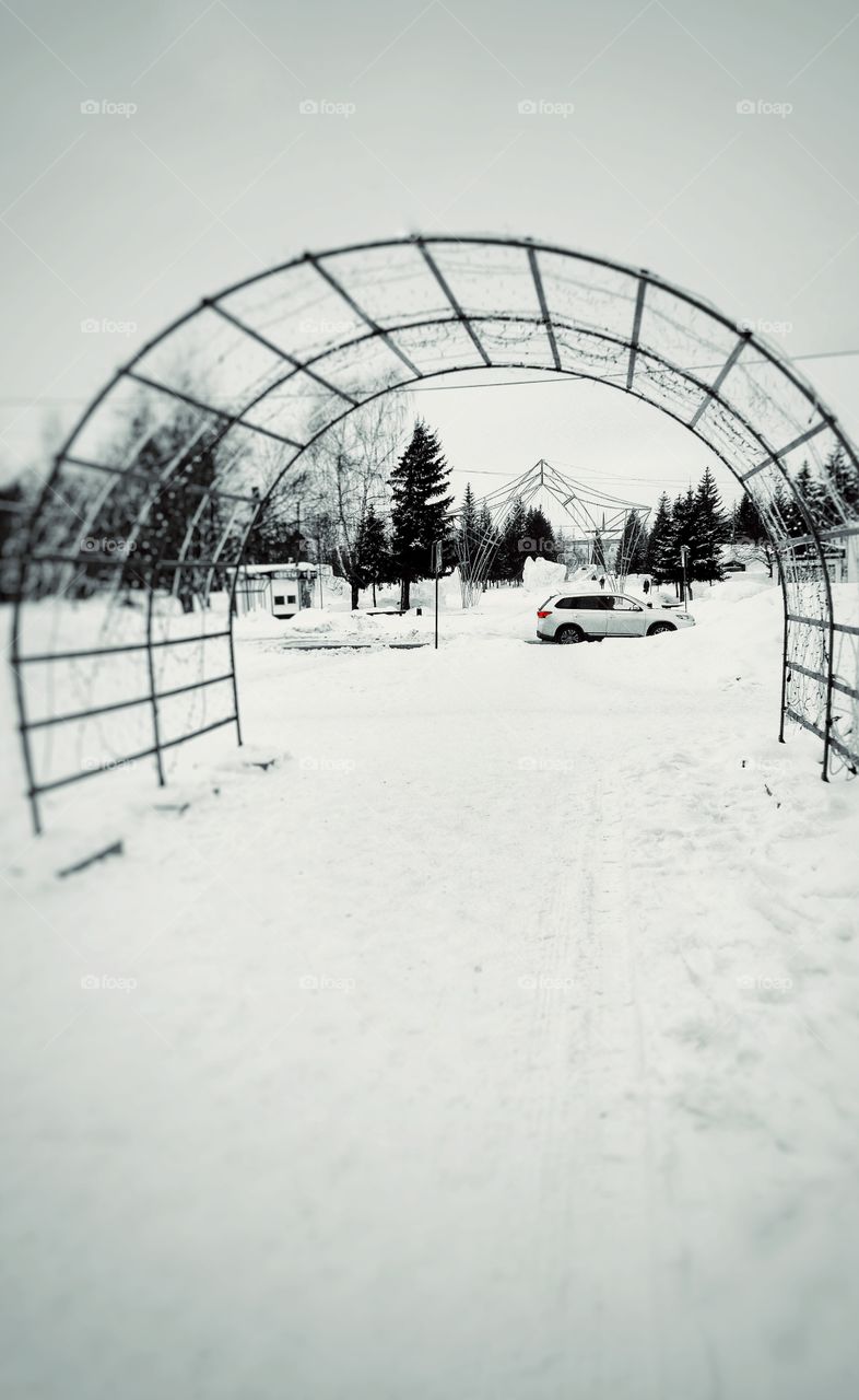 car. winter. park. black and white. red.