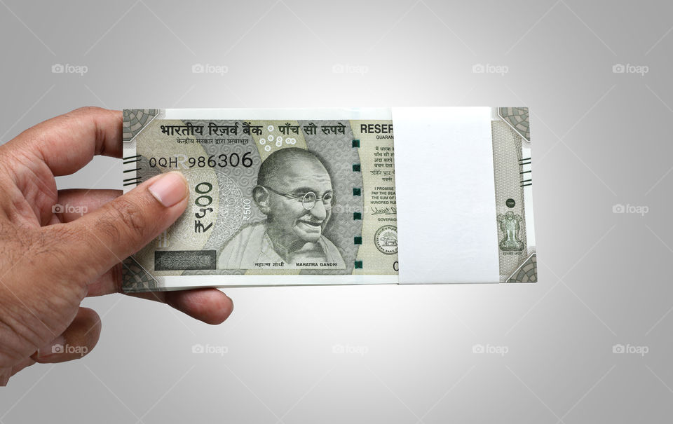 Indian currency rupee 500 Bank note in a hand