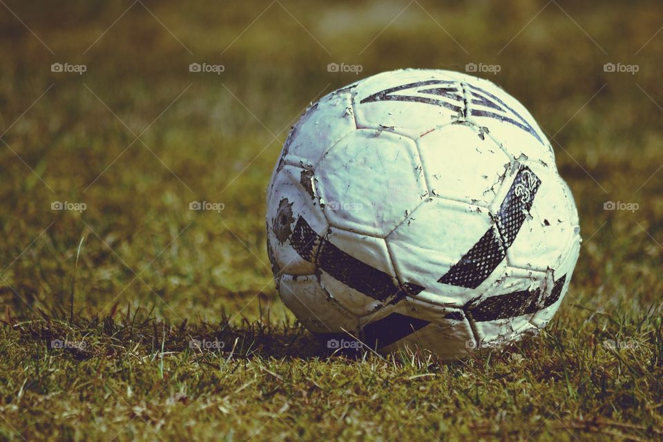 Football. Old and broken football