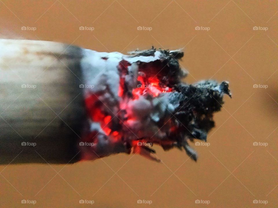 fire at the end of the cigarette