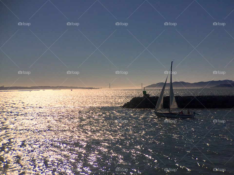 Seascape, sunset, sailboat 