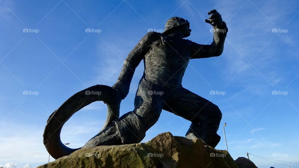 The Rescue. Statue in Seahouses Northumberland 