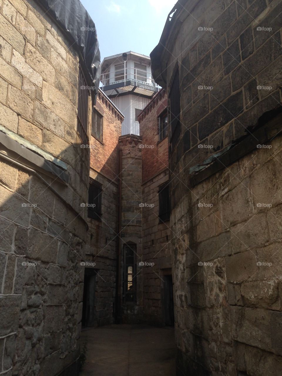 Eastern State Penitentiary . The central tower of the world's first modern prison flanked by two cell blocks