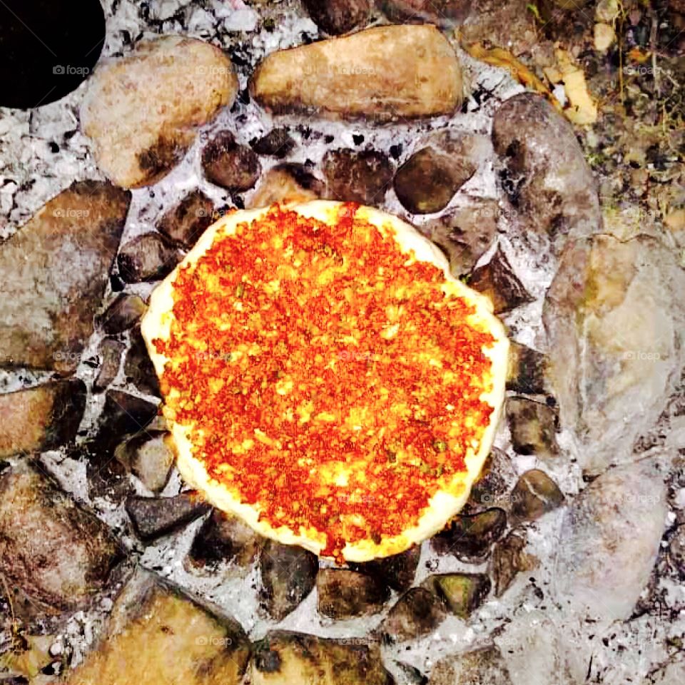 Delicious Berber pizza cooked over a wood fire