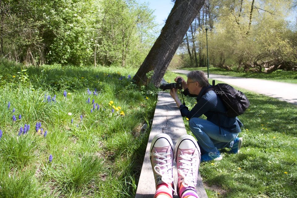 Man photographing in plant