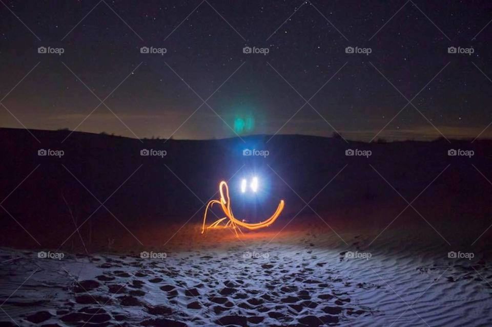 SMILE! This light painting appears desolate in the wilderness, but you’re greeted by a welcoming smile as a sharp contrast to the landscape.