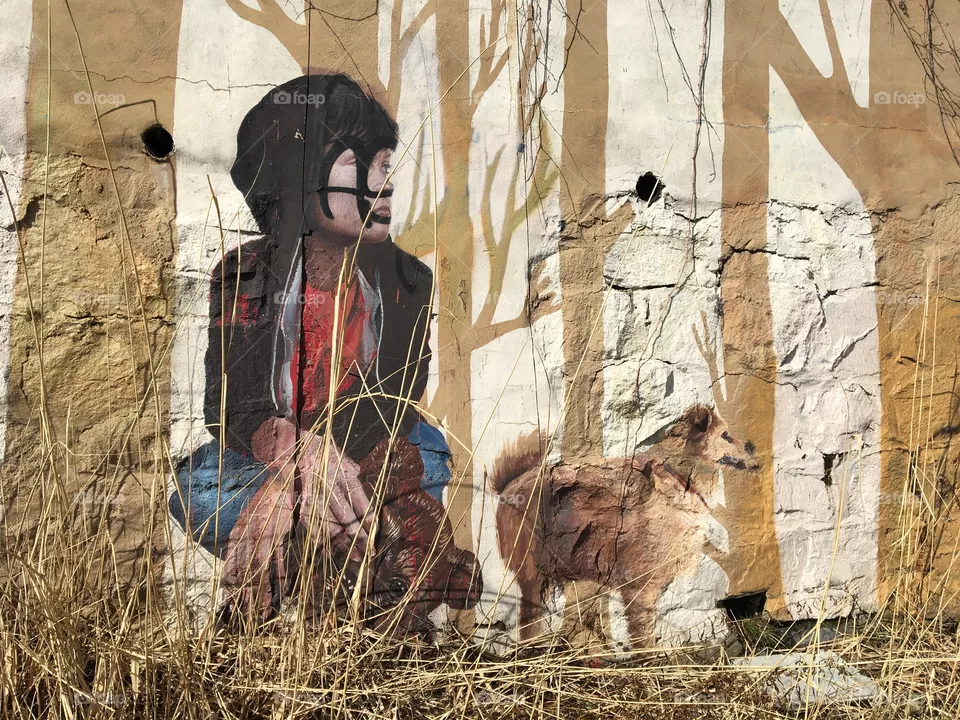Boy and dog mural 