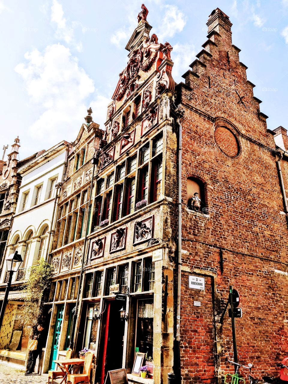 Medieval historical properties along Ghent’s famous Kraanlei - corner house “the flutist”