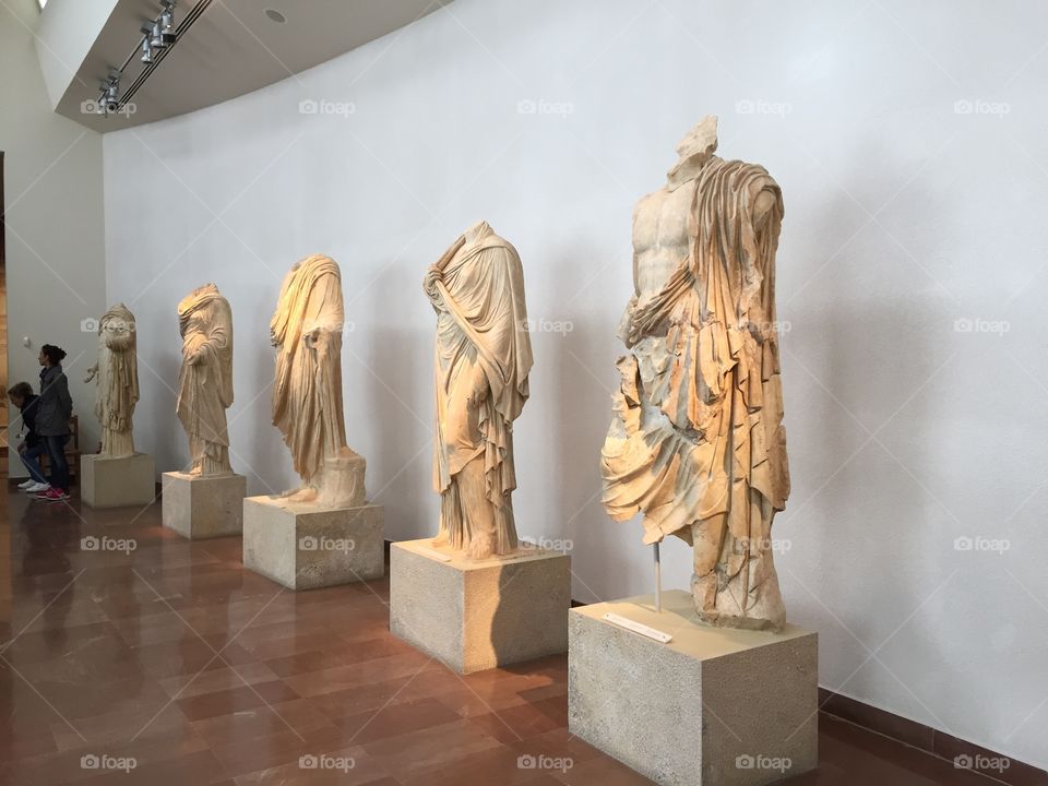 This is what represents me: my passions are animals, art, photography, music, travelling and nature. 
This one in particular represents art: these statues belong to a museum in Athens, Greece.