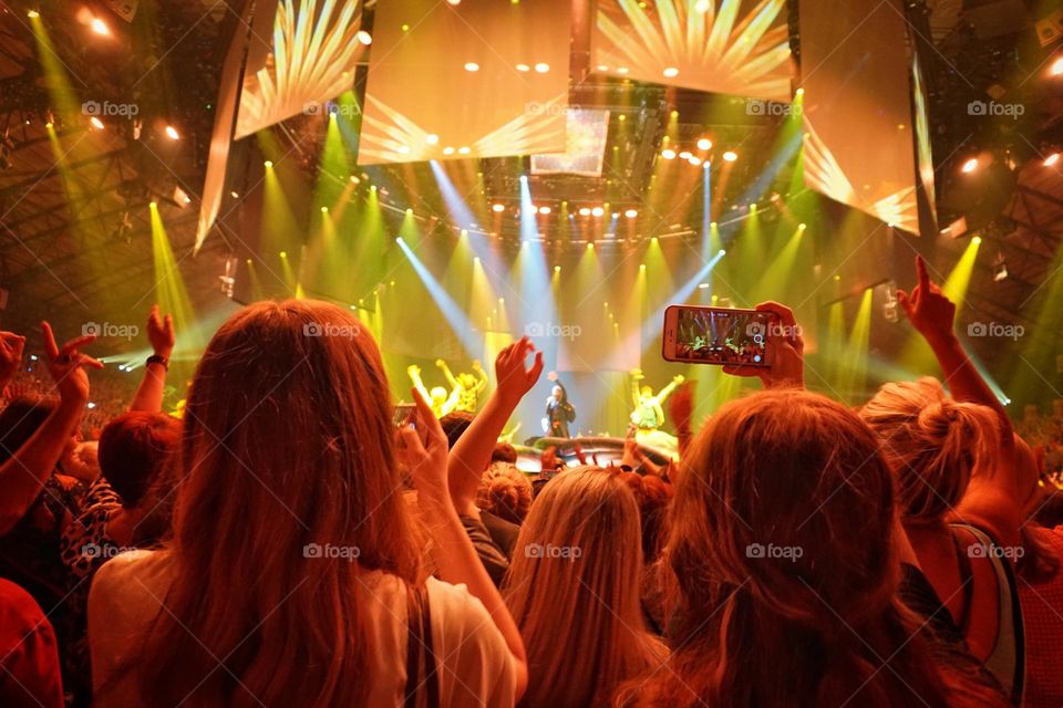 Crowds of fans at a concert 🎵