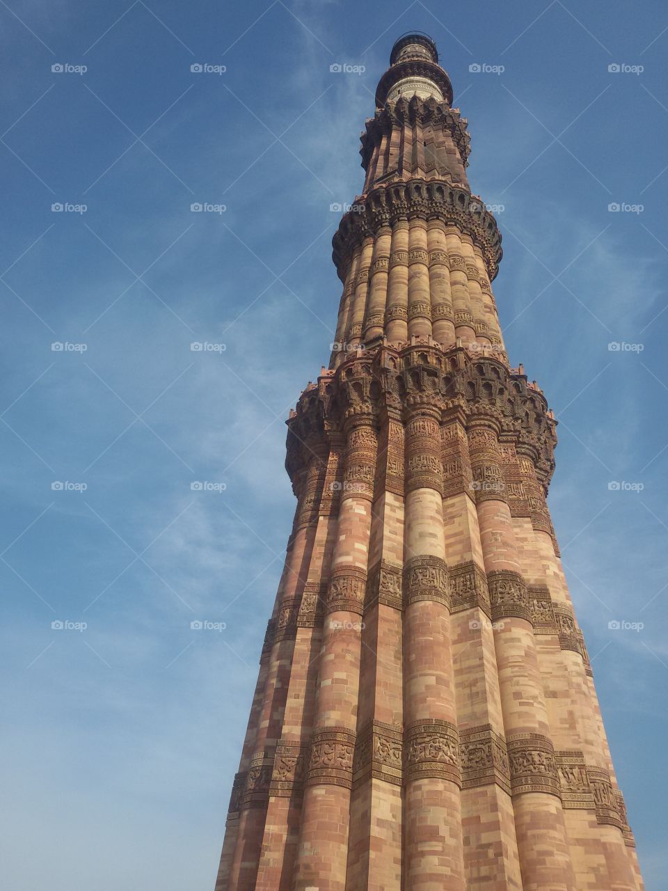 Qutub Minar is a minaret that forms part of the Qutb complex, a UNESCO World Heritage Site in the Mehrauli area of Delhi, India
