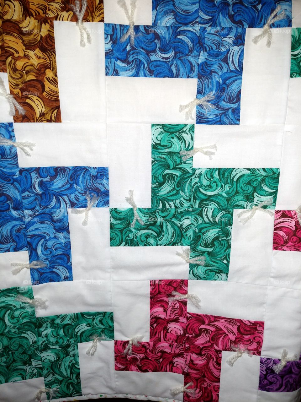 L pattern lap quilt